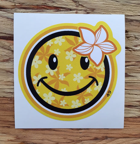 happy face with yellow floral pattern and flower decal