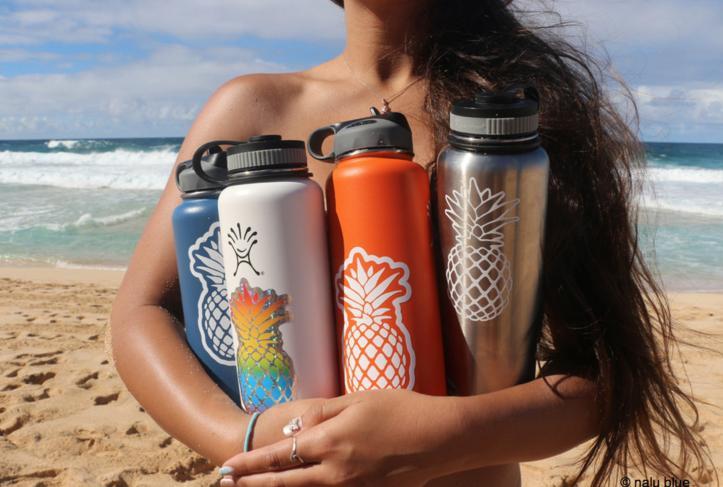 hydroflasks with pineapple stickers